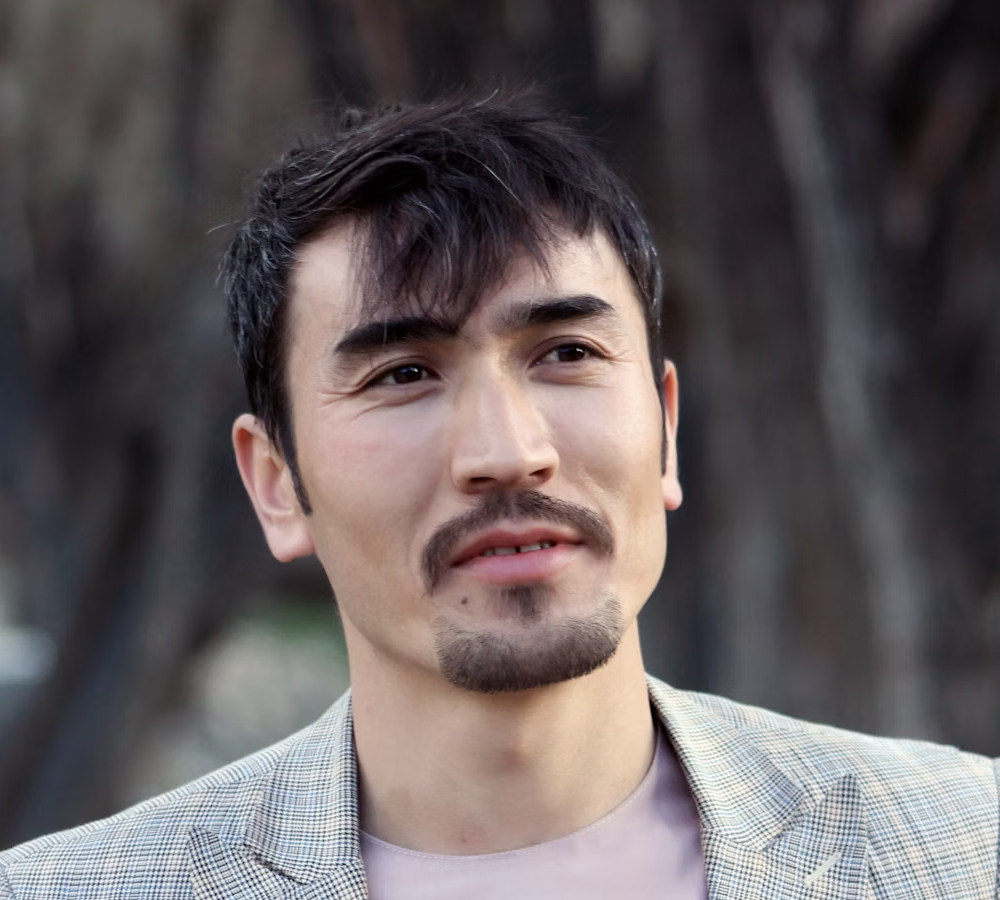 Man looking away outdoor portrait