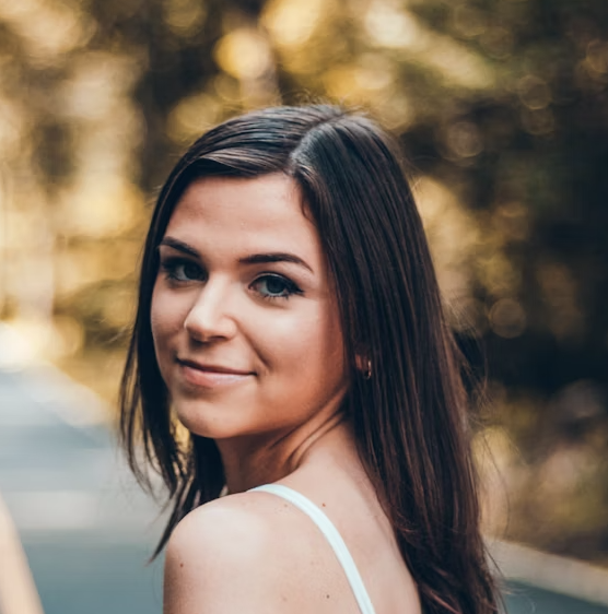 Smiling brunette woman outdoor portrait